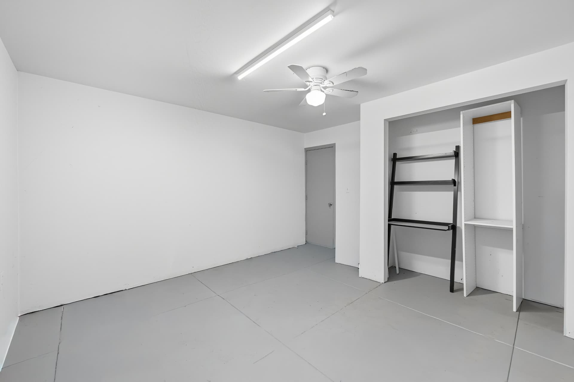 Converted garage finished as a bright, plastered and painted internal room